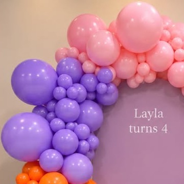 Purple, pink and orange balloon arch
